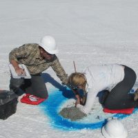 students drilling on salt flats